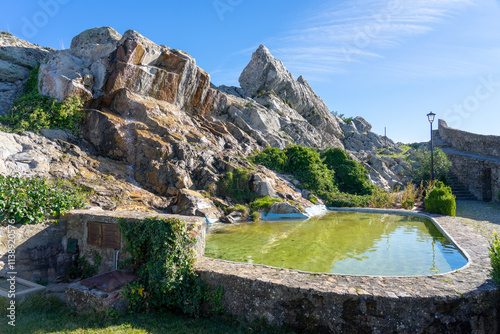 Interior of Marvãoo castle with artificial lake and rock formations designated as wallow.Marvão-Portugal