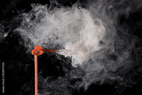 Plastic bio degradable straws with mist shooting from straws creating unique patterns
