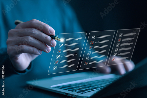 tick mark evaluation in the options check form online on a laptop. checklist concept, task audit in a list of documents. verify task detail business, process order. tick the checkmark in the survey it photo