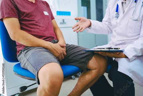 A man suffering from urinary tract infections visits a doctor at the examination table in a hospital.symptoms, discusses benign prostatic hyperplasia (BPH), and provides advice and treatment