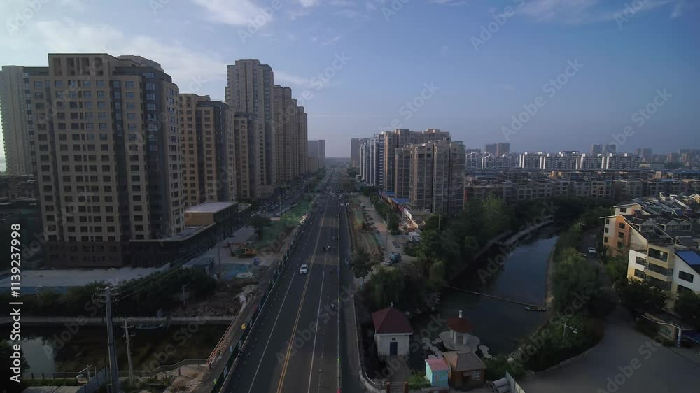 Exploring Lianyungang's Urban Landscape with Aerial Views of CBD and Street Activity Exploring Lianyungang's Urban Landscape with Aerial Views of CBD and Street Activity