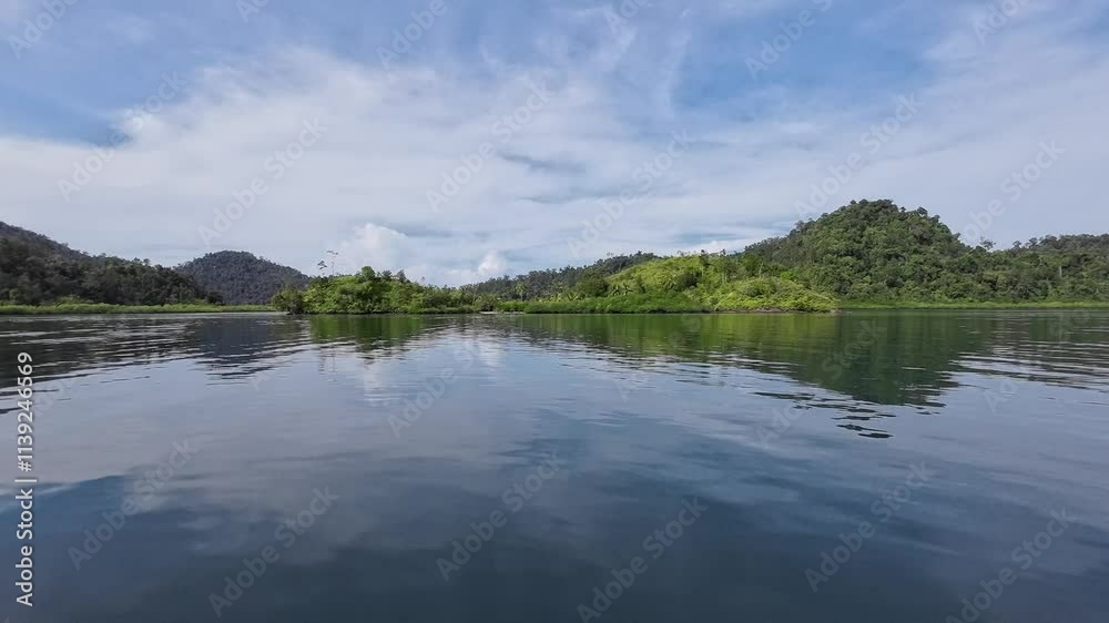 Views of the sea, islands and hills. Blue and cloudy sky. Moves forward scene Views of the sea, islands and hills. Blue and cloudy sky. Moves forward scene