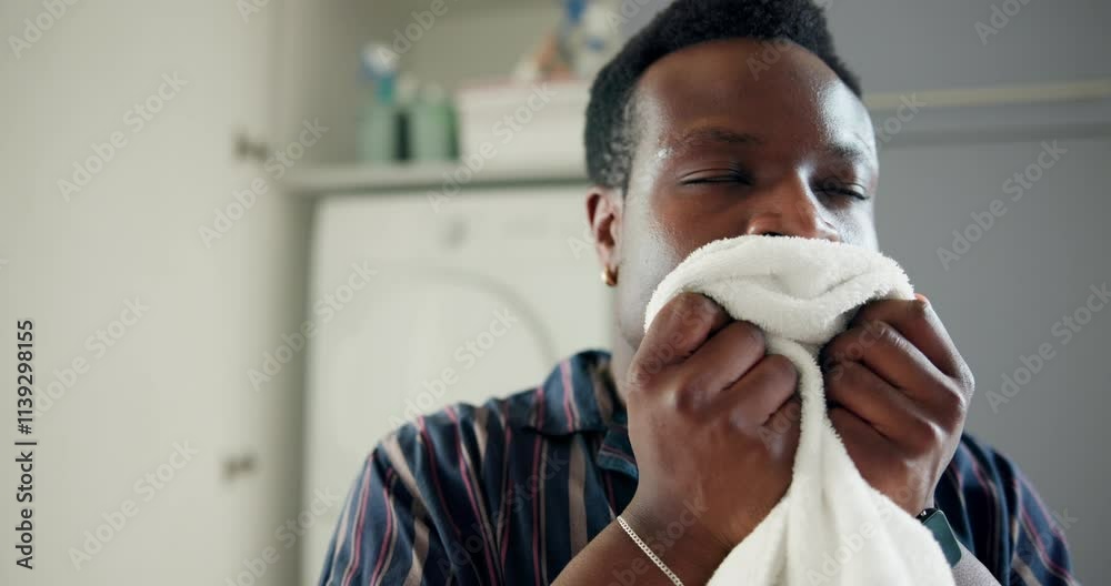 Laundry, man and smell blanket in home for clean fabric, fresh scent and linen fragrance for happy memory. Housekeeping, black person and smile with textile aroma for comfort, nostalgia and hygiene