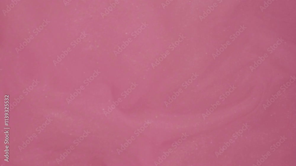 Shimmering vapor. Mist cloud. Defocused pink color sparkling particles paint water splash flow motion abstract art background.
