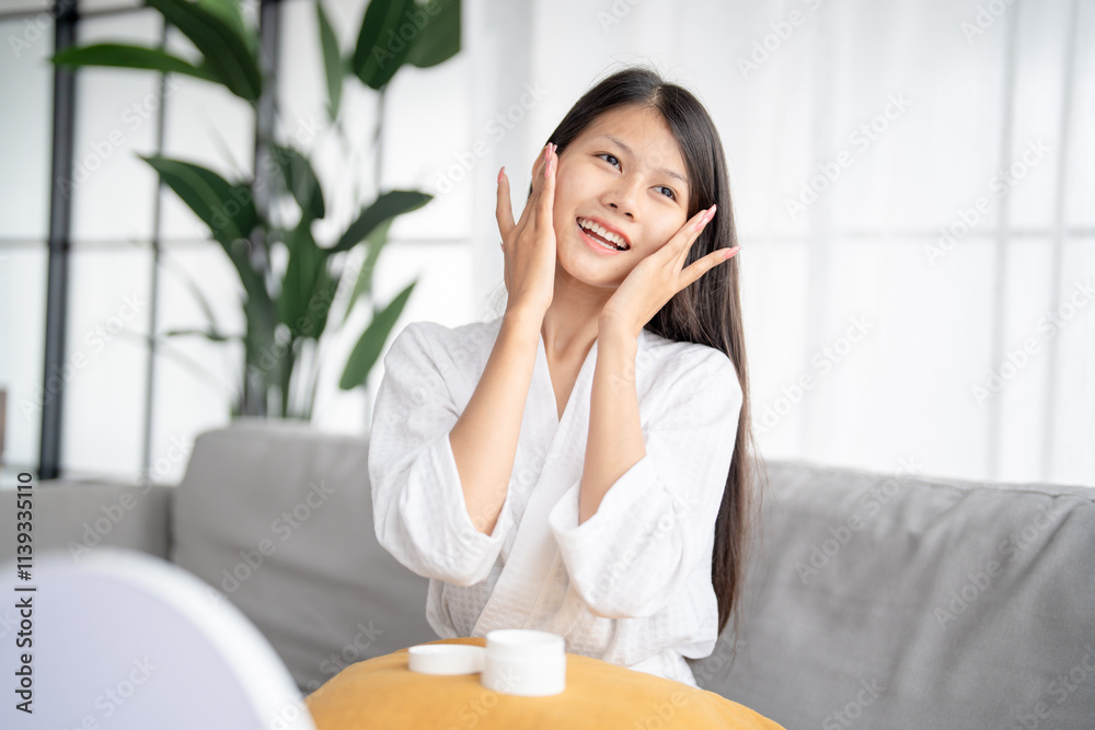 Asian woman applying Skincare moisturizer lotion Daily beauty routine self care relax Asian woman applying Skincare moisturizer lotion Daily beauty routine self care relax