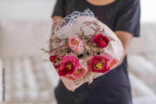 wedding bouquet of roses with paper