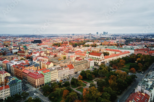 Prague architecture, aerial view. Historical buildings with red roofs in European city. Birds eye view of cityscape of Praha, Czech Republic