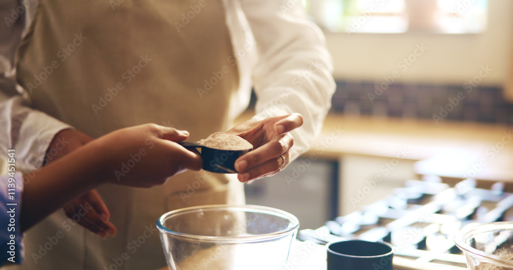 Hands, parent and kitchen with mixture for baking for Christmas dessert, cake and meal prep at home. People, learning and teaching or helping for culinary skill with child development and growth Hands, parent and kitchen with mixture for baking for Christmas dessert, cake and meal prep at home. People, learning and teaching or helping for culinary skill with child development and growth