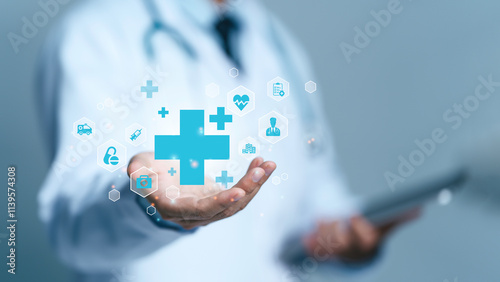 Male medicine doctor hold healthcare medical icons for the Health insurance concept in hospital background