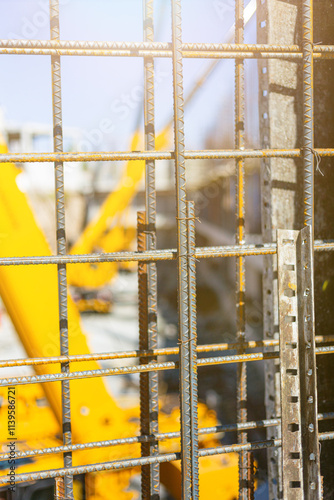 Iron grate or reinforcement poured with concrete at a construction site, Formwork supports the second floor of a monolithic building. Reinforcement of walls and ceiling. Monolithic work photo