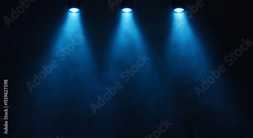 Three Blue Spotlights Illum...