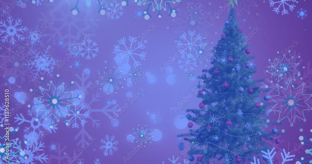 Image of snow falling over christmas tree in winter scenery Image of snow falling over christmas tree in winter scenery