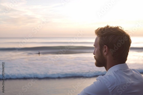 Serene ocean waves at sunrise provide a beautiful, calming backdrop with soft light shimmering on the water, perfect for relaxation and meditation.