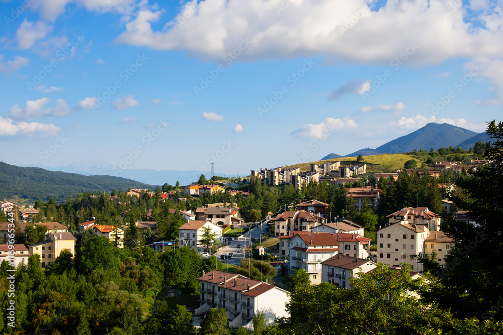 Obraz premium Panoramic view of Rivisondoli, nestled in the Majella National Park, Abruzzo, showcasing picturesque mountain scenery