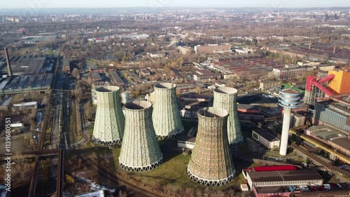 Unused Old Cooling Towers Of Power Plant. - aerial shot