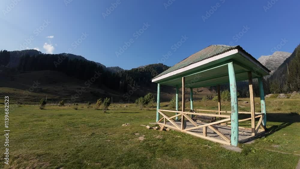 The Mountain's Embrace: A Rustic Gazebo Nestled in a Secluded Valley The Mountain's Embrace: A Rustic Gazebo Nestled in a Secluded Valley