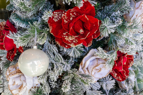 Close up view of New Year and Christmas fur-tree toys at Christmas tree 