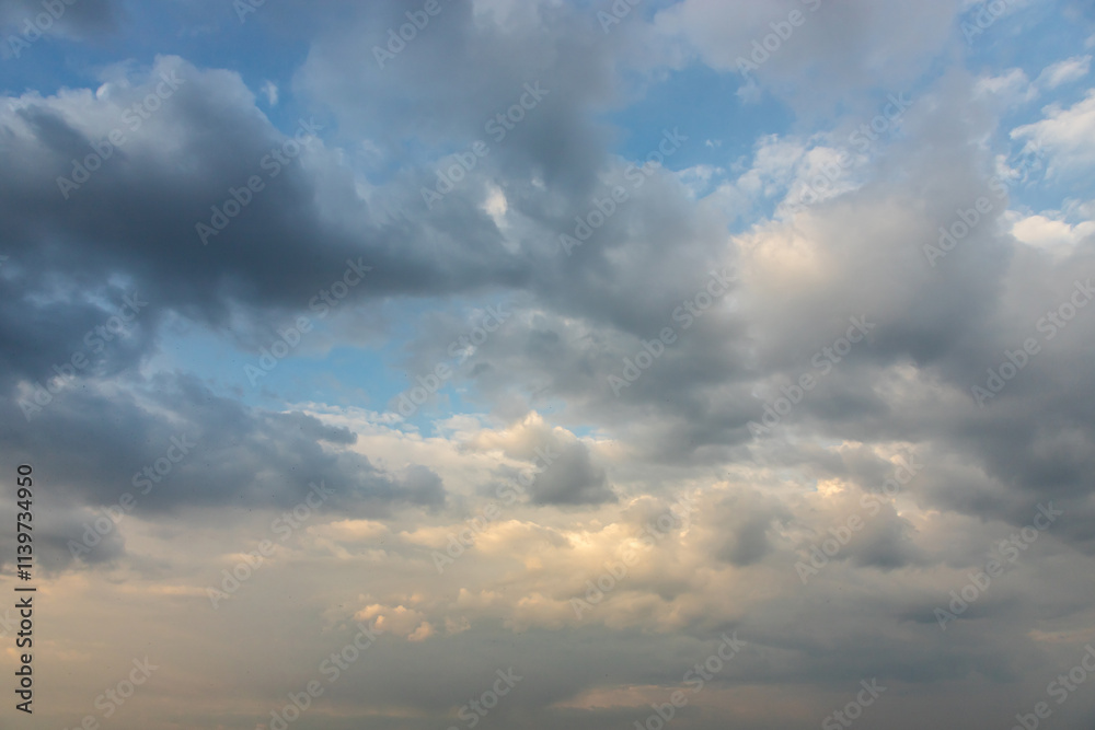 Ornamental clouds. Dramatic sky. Epic storm cloudscape Soft sunlight. Panoramic image texture background graphic resources design Meteorology, heaven hope peace concept Ornamental clouds. Dramatic sky. Epic storm cloudscape Soft sunlight. Panoramic image texture background graphic resources design Meteorology, heaven hope peace concept