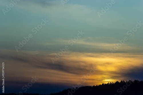 Horizon panorama and dramatic twilight sky and cloud sunset background. Natural sky background texture, beautiful color. Dark clouds, big storm and rain. Weather and nature concept