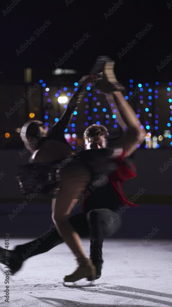 Figure skating motion blur, young couple performs a dramatic dance on ice, professional gymnasts at competitions, passionate dance, winter sports.