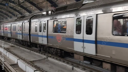 New Delhi, India, August 12 2024 - Delhi Metro train arriving at Jhandewalan metro station in New Delhi, India, Asia, Public Metro departing from Jhandewalan station