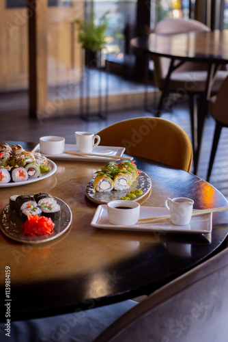 Set Table with Sushi and Cutlery in a Restaurant