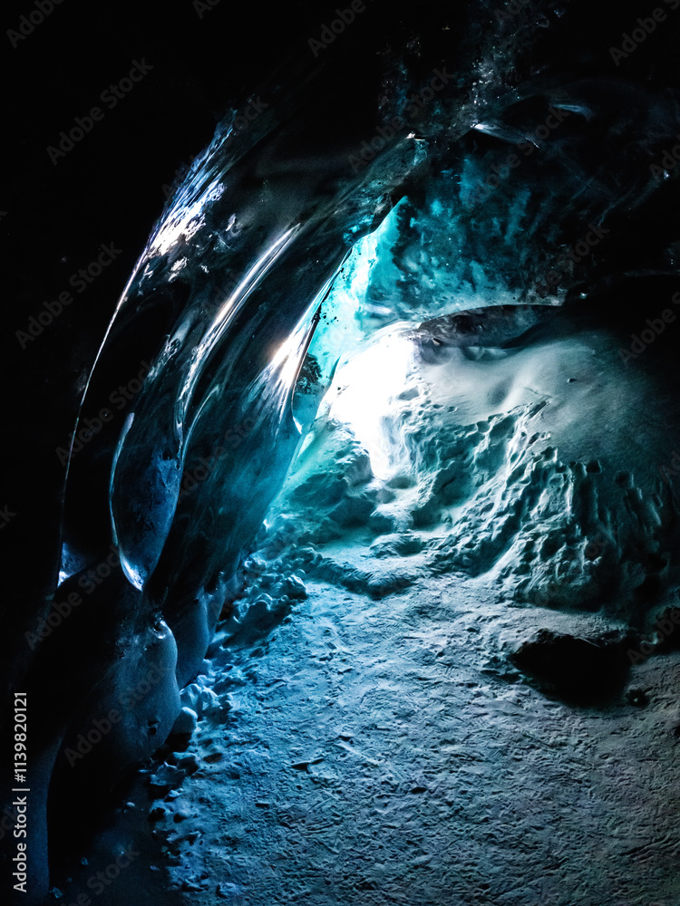 Glacial Cave: A Frozen Marvel in the Tian Shan Mountains of Central Asia, Near Almaty, Kazakhstan's National Park. Glacial Cave: A Frozen Marvel in the Tian Shan Mountains of Central Asia, Near Almaty, Kazakhstan's National Park.