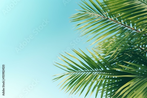 Wallpaper Mural Vibrant green palm leaves create a tropical feel against a serene blue sky, evoking a sense of tranquility and summer vibes Torontodigital.ca