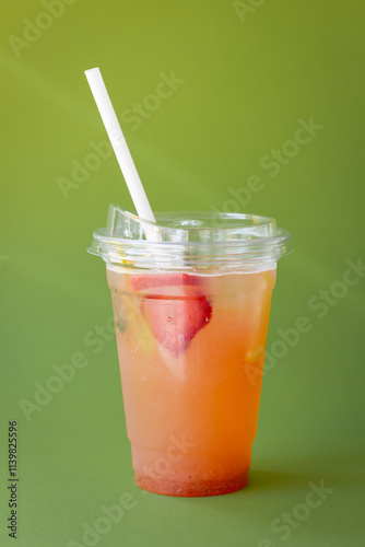 Strawberry Lemonade on a Solid Green Background