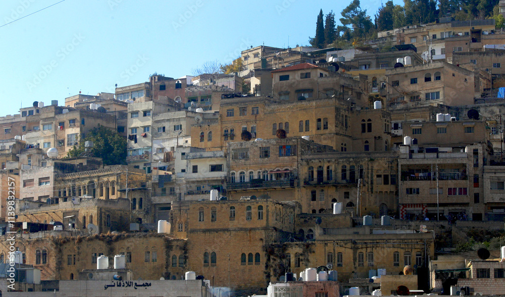 Old houses on the slope of a mountain in the middle of the mountainous city of Salt Old houses on the slope of a mountain in the middle of the mountainous city of Salt