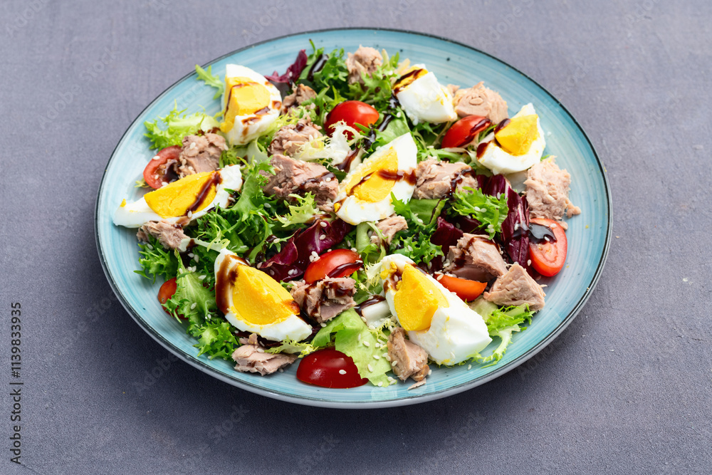Canned Tuna salad with eggs and tomatoes photography . Top view Canned Tuna salad with eggs and tomatoes photography . Top view