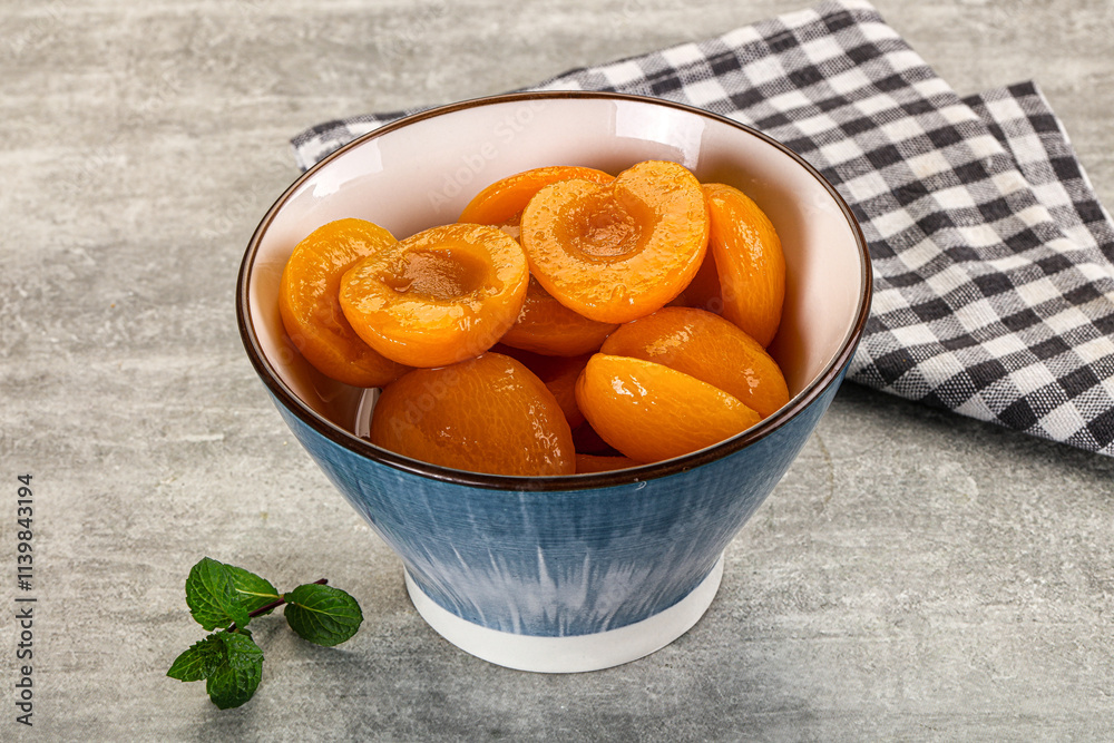 Sweet canned apricots with syrope Sweet canned apricots with syrope