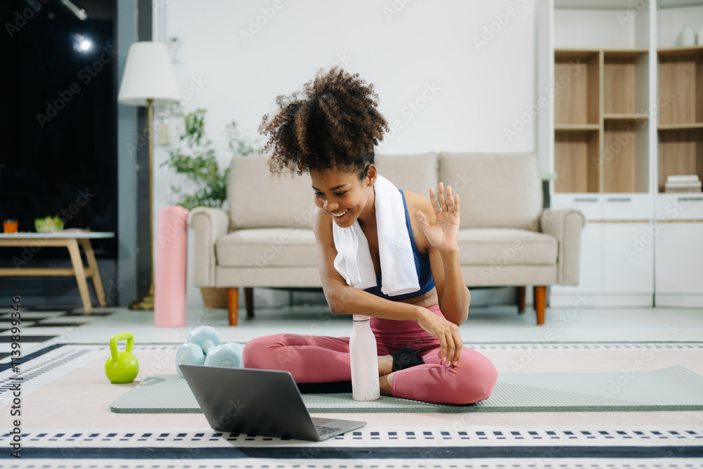 Obraz premium A young woman practices yoga and stretching with a mat and gym props, showcasing wellness, motivation,