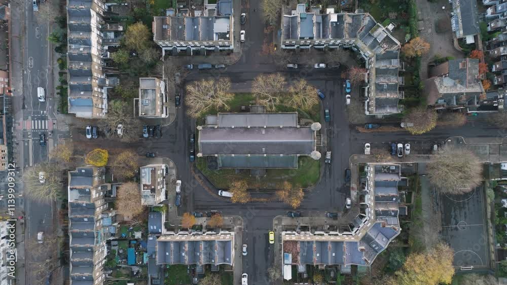 Top-down aerial push-in emphasizing Holy Trinity Church and the organized residential streets of Barnsbury, London Top-down aerial push-in emphasizing Holy Trinity Church and the organized residential streets of Barnsbury, London