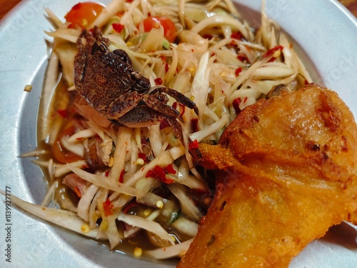 Spicy Papaya Salad with Salted Crab and Fermented fish (SOMTUM)