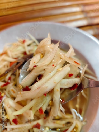 Spicy Papaya Salad with Salted Crab and Fermented fish (SOMTUM)
