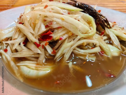 Spicy Papaya Salad with Salted Crab and Fermented fish (SOMTUM)