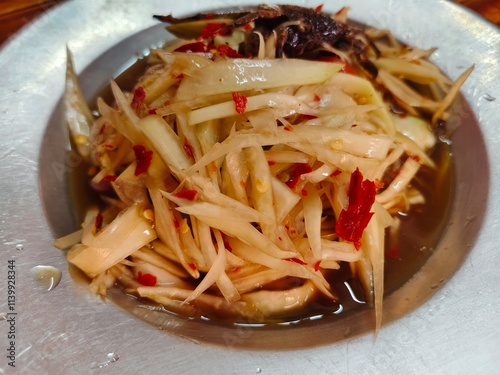 Spicy Papaya Salad with Salted Crab and Fermented fish (SOMTUM)