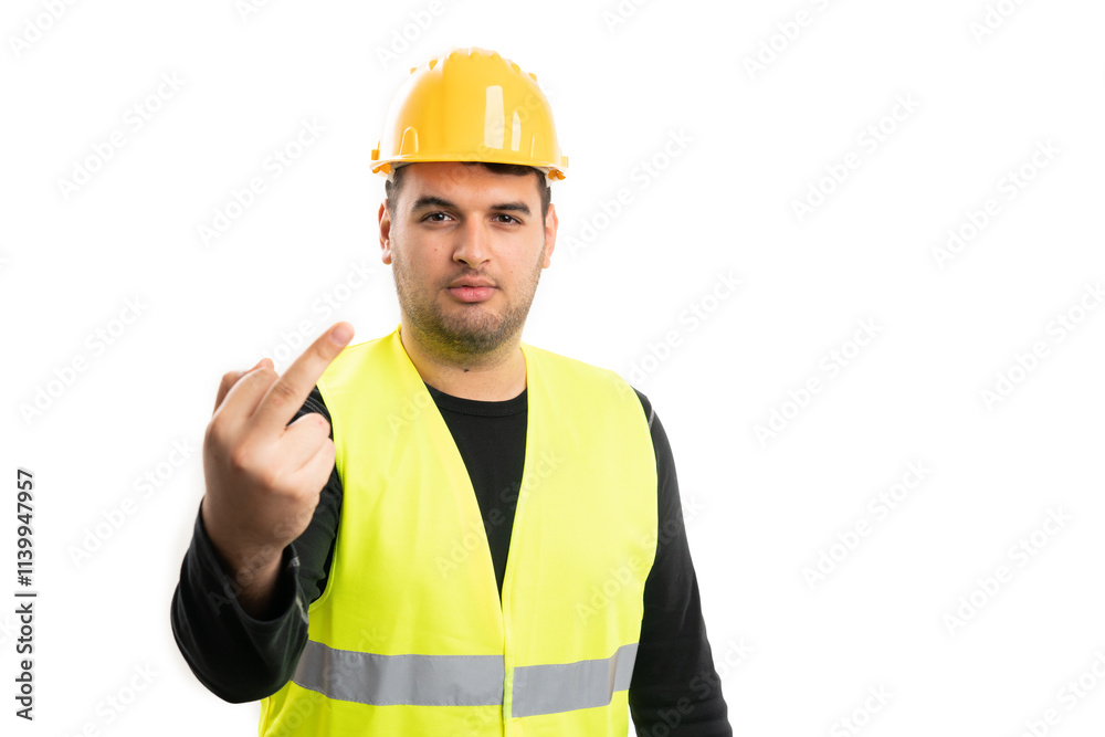 Angry builder man showing middle finger as offensive gesture Angry builder man showing middle finger as offensive gesture