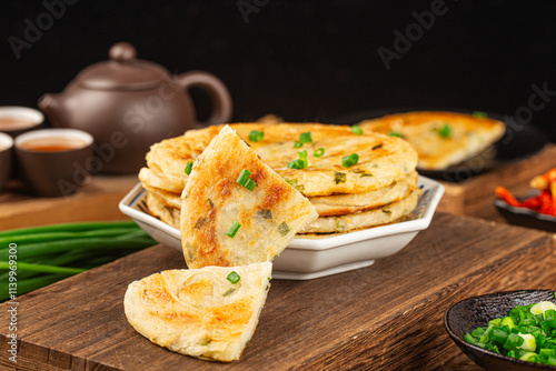 Green onion pancakes are a fried Chinese flatbread often eaten as a snack or with a meal.