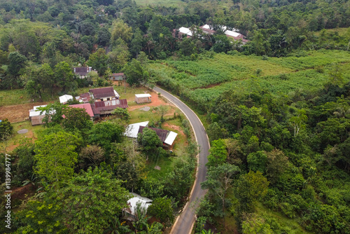 View over a paved road in the countryside in the afternoon