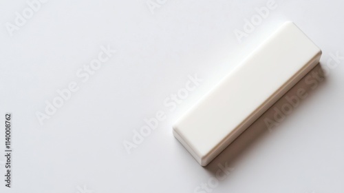 Slightly Used White Eraser on Plain Background photo