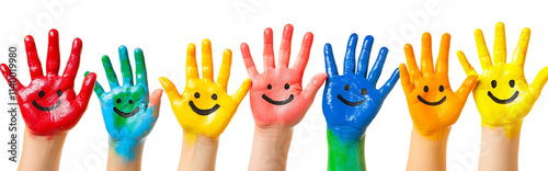 Colorful painted hands with smiley faces in a row against black background
