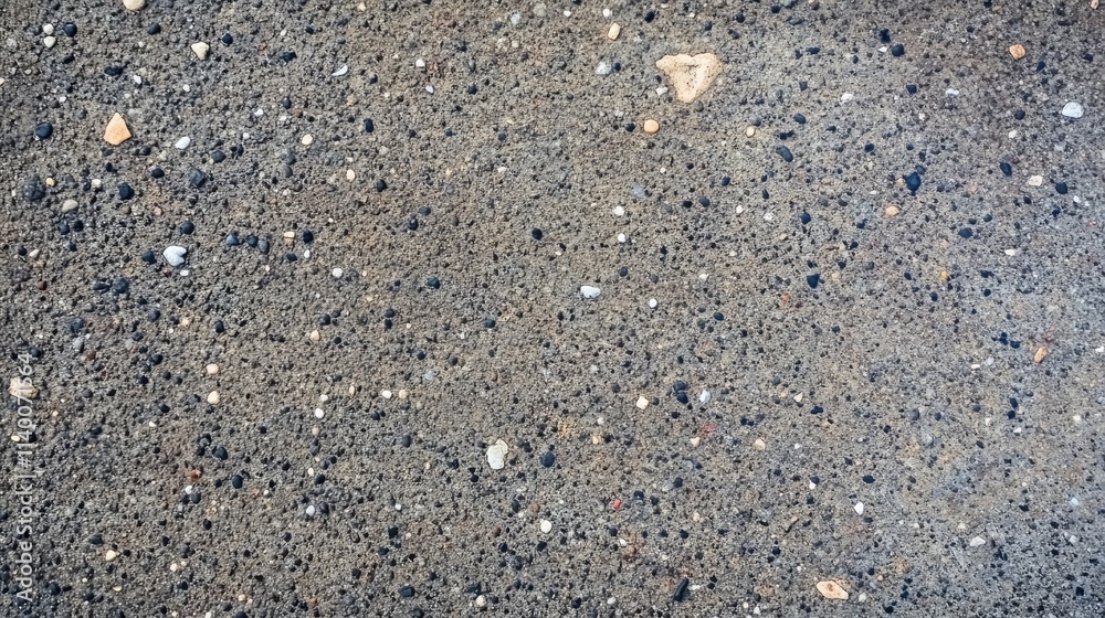 Dark textured cement floor with speckled details for use in abstract backgrounds and designs. Dark textured cement floor with speckled details for use in abstract backgrounds and designs.