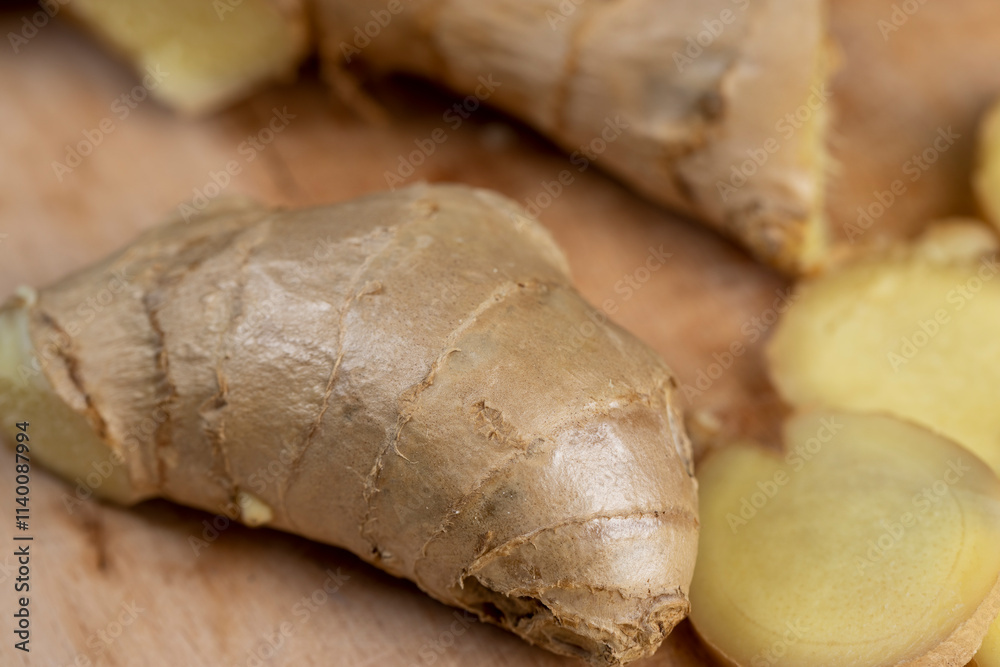 Fototapeta premium details of the ginger root used in cooking sliced into pieces