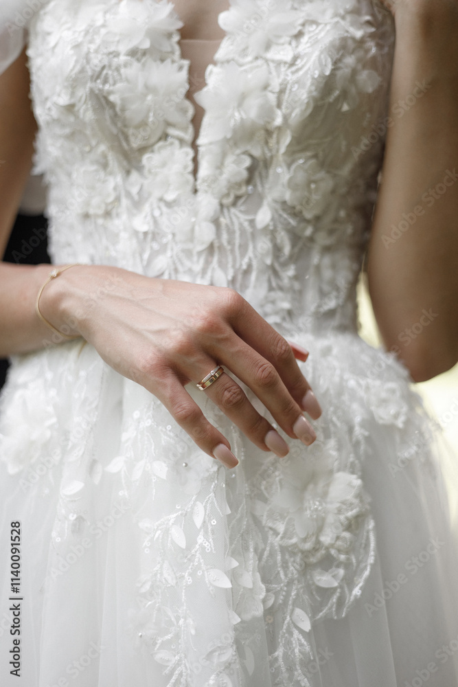 An Elegant Bridal Dress Featuring Stunning Hand Detail with Beautiful Floral Embellishments An Elegant Bridal Dress Featuring Stunning Hand Detail with Beautiful Floral Embellishments