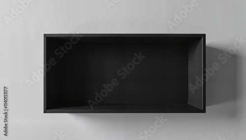 Black storage box on gray background with copy space for organization and design