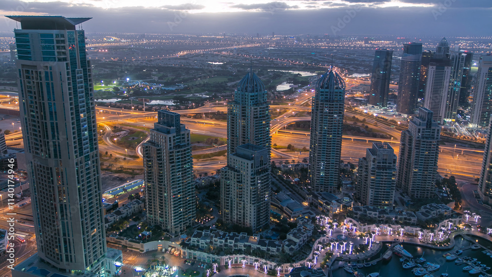 Obraz premium Dubai marina harbor panorama from night to day transition timelapse