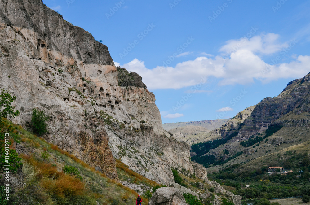 View of Vardzia caves. Vardzia is a cave monastery site in southern Georgia, excavated from the slopes of the Erusheti Mountain on the left bank of the Kura River. Travel for tourists View of Vardzia caves. Vardzia is a cave monastery site in southern Georgia, excavated from the slopes of the Erusheti Mountain on the left bank of the Kura River. Travel for tourists