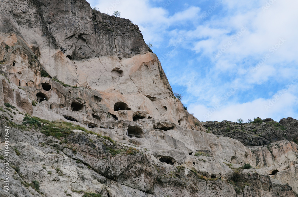 View of Vardzia caves. Vardzia is a cave monastery site in southern Georgia, excavated from the slopes of the Erusheti Mountain on the left bank of the Kura River. Travel for tourists View of Vardzia caves. Vardzia is a cave monastery site in southern Georgia, excavated from the slopes of the Erusheti Mountain on the left bank of the Kura River. Travel for tourists
